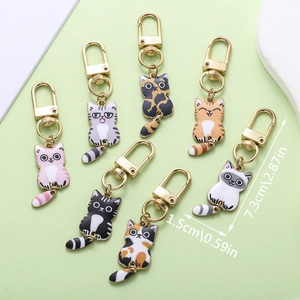Niedliche Katzen-Schlüsselanhänger im 7er Set mit goldenem Karabinerhaken 7,3cm