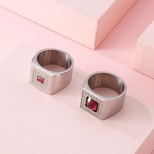 Silver stainless steel ring with red ruby gemstones and cubic zirconia on geometric blocks