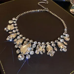 Elegant vintage bridal necklace with water drop tassels and sparkling crystals in silver