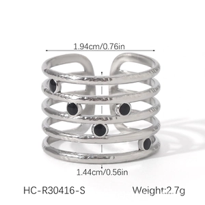 Detailed view of layered silver ring with hammer texture and dimensions 1.94cm x 1.44cm