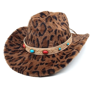 Macro view of leopard print faux fur cowboy hat with turquoise gemstone woven band