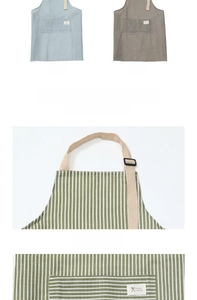 Detail of adjustable neck strap and large front pocket on striped kitchen apron