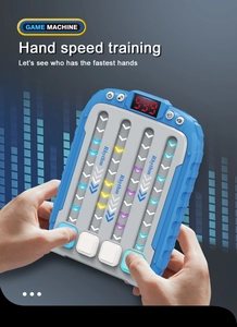 Close-up of a blue rhythm hand speed training game machine held by a hand in professional studio