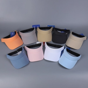 Nine colorful sports sun visors with SUEART embroidery and elastic straps displayed
