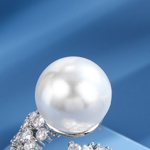 French style pearl ring with zircon accents on an adjustable silver band