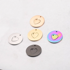 Mirror polished heart cutout pendant charms in gold, silver, black, and rose gold finishes