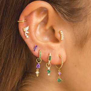 Detail of S925 sterling silver butterfly ear studs with tassels and colorful zircon gems