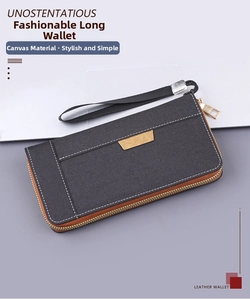 Vue détaillée de la pochette en toile pour homme avec coutures et dragonne noire