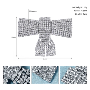 Detailed view of silver rhinestone bow hairpin with specific size measurements