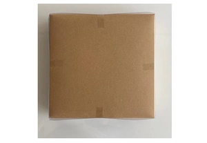 Detailed view of natural brown kraft paper gift box with transparent lid for ornament storage