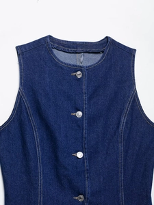 Detail of dark blue denim vest with round neck, sleeveless cut and metal buttons