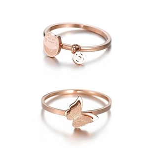 Rose gold stainless steel rings featuring lucky cat charm and frosted butterfly designs