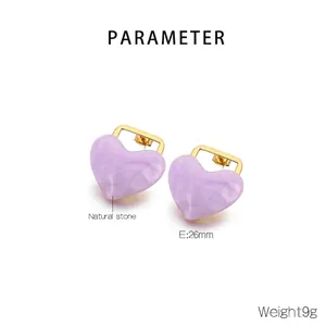 Detail of light purple natural stone heart stud earrings with 18K gold plated hardware
