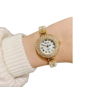 Elegant gold pearl bracelet watch for women with rhinestone bezel and shell dial