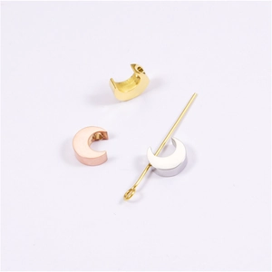 Close-up detail view of titanium steel crescent moon loose beads for DIY jewelry making accessories.