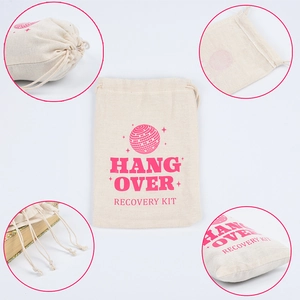 Beige cotton Hangover Recovery Kit gift bags featuring a pink disco ball pattern