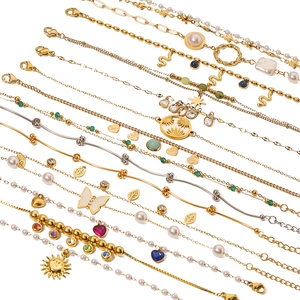 Vintage stainless steel bracelets with natural stones, pearls, and butterfly pendants