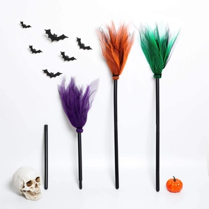 Halloween witch broomsticks with LED lights in purple, orange, and green tulle for parties