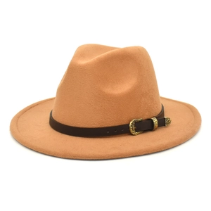 Detail of camel wool felt fedora featuring a brown leather band and gold vintage buckle