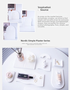 Macro shot of white arch and wavy plaster trays for cosmetic photography background
