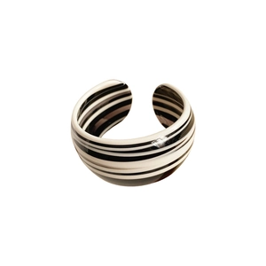 Retro black and white striped acetate open cuff bracelet with a minimalist C-shape design