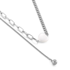 Asymmetric silver paperclip chain necklace featuring a white heart pendant and tassel