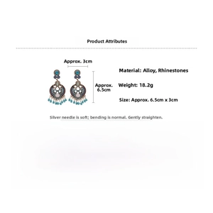 Detail view of vintage leaf drop earrings with turquoise stones and dimensions