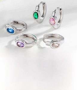 Detail of 8mm silver copper hoops with oval colorful cubic zirconia inlays
