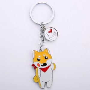 Detailed close-up of a Shiba Inu metal keychain with silver ring and I Love Dogs tag