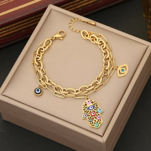 Double-layered golden Hamsa Hand and Evil Eye pendant bracelet with elegant chain links