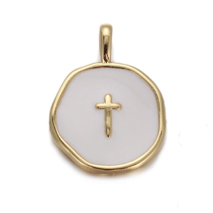 Macro view of gold-rimmed white enamel pendant with a small gold cross detail