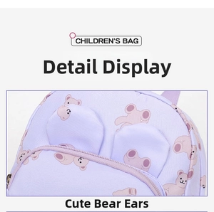 Close-up of cute pink bear print and decorative badge on light purple kids backpack