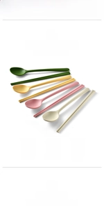 Close-up of food-grade silicone spoon and chopsticks set in soft Morandi colors