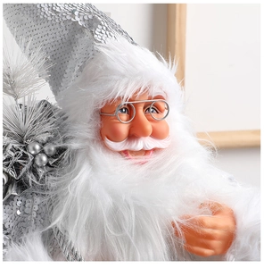 Close-up of Santa Claus doll with silver sequin hat and round metal glasses decor