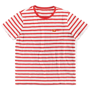 Close-up of red and white striped t-shirt with a chest pocket and fine cotton texture