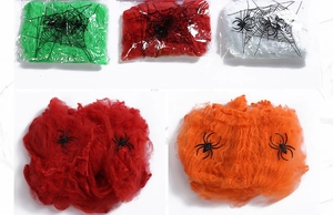Colorful Halloween spider web decorations with plastic spiders in red green orange and white