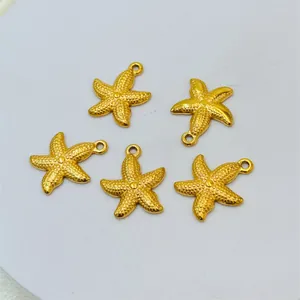 Set of five golden starfish charms with textured details for ocean-themed jewelry making