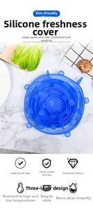Set of 6 blue stretch silicone food covers in various sizes on a marble background