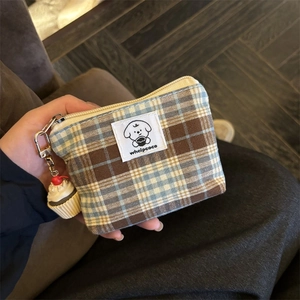 Vintage checkered wallet with cake pendant and blue-brown plaid fabric texture