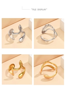 Detailed view of gold and silver irregular wavy rings in adjustable open design