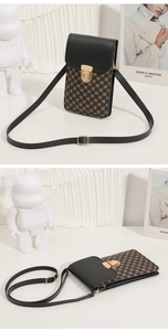 Close-up of contrast-color mini crossbody bag with circular pattern and gold buckle