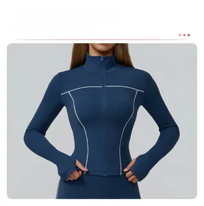 Detail view of navy blue yoga jacket with 3D stitching lines and thumbhole sleeves