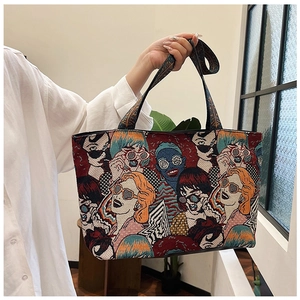 Detail der Jacquard-Einkaufstasche mit Vintage-Pop-Art-Print und gewebten Henkeln