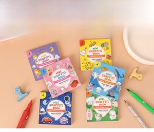 Detail of 6 mini cartoon coloring books with different themes and colorful covers