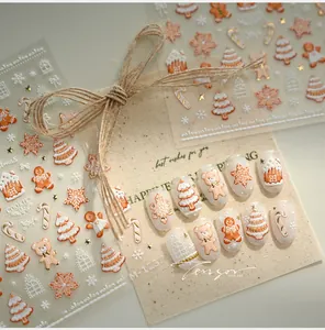 3D geprägte Weihnachts-Nagelaufkleber mit Lebkuchenmann, Schneeflocken und Bäumen
