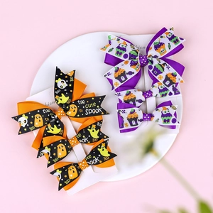 Halloween bow hair clips set featuring pumpkin and ghost patterns for kids and babies