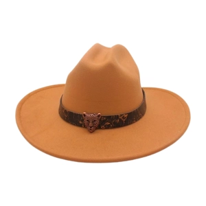 Detail of camel felt fedora hat featuring a leopard head metal buckle on a dark band