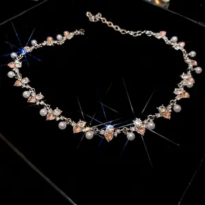 Pink heart crystal and pearl necklace with sparkling rhinestones in a blue gift box