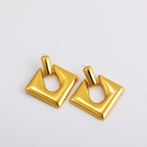Detailed view of large 18K gold hollow square geometric hoop earrings with polished finish
