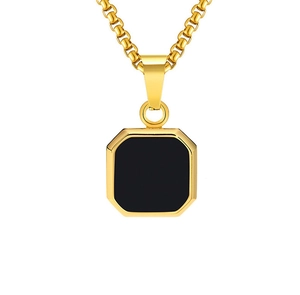 Detailed close-up of 18K gold-plated octagonal pendant with black enamel inlay